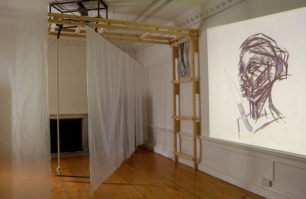Emma Woffenden: Locked Rooms. No Horizon, part 3, 2004. Trapeze on pause with view of Ann Course's film