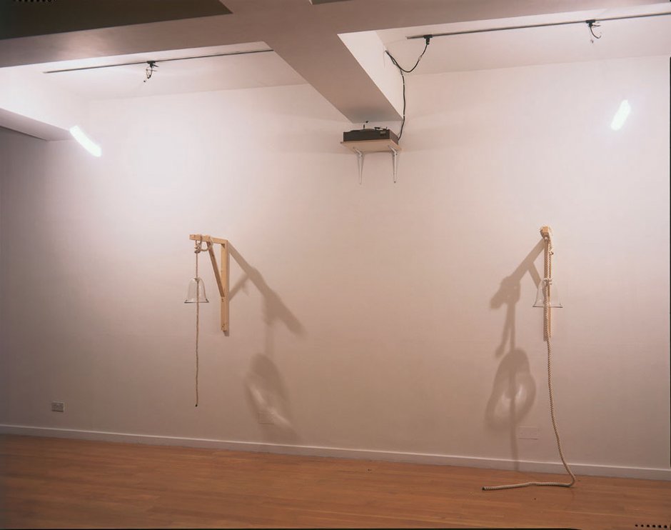 Emma Woffenden: Exquisite restraint. No Horizon, part 2, 2003. Swinging Around. As an ambition to make works move I realised moving the light source would mean the shadows would perform. The turntable was chosen as the rpm matched the speed needed to agitate the bulbs on their cable.