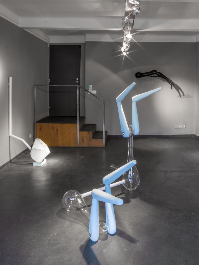 Emma Woffenden: Contact Isolation, 2019. Head over Heels, blown glass, plastic pipe and styrofoam.