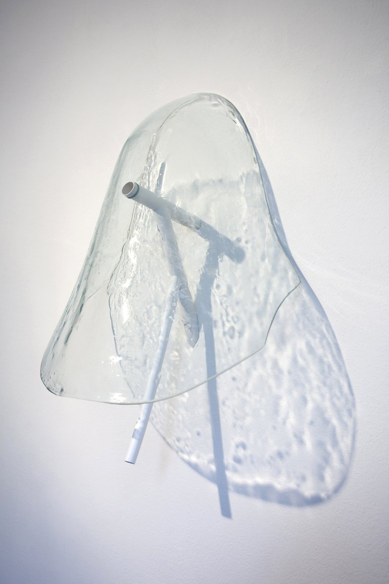 Emma Woffenden: wind pipe, 2012. Wind Pipe. photo Phil Sayer courtesy of MarsdenWoo gallery. Dimensions 60x45x28cms. Glass and plastic pipe.